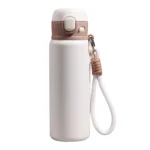 Premium cream white 480ml tea separation tumbler featuring a durable braided rope handle for portable carry.